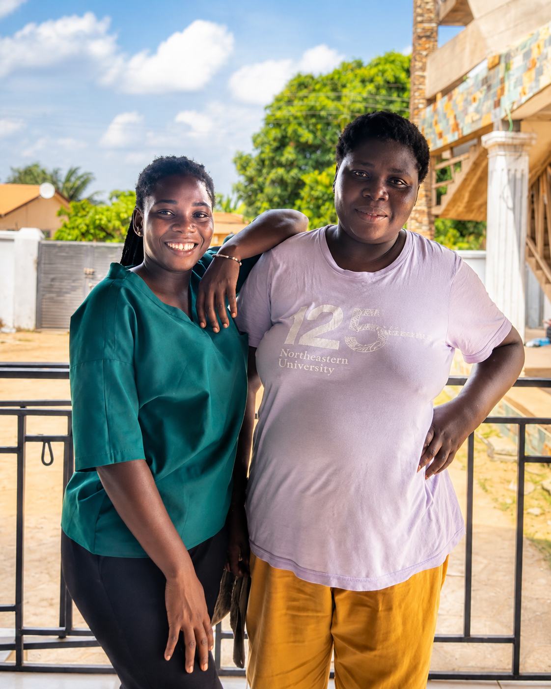 JASBEK caregiver standing with a client in a home care setting.