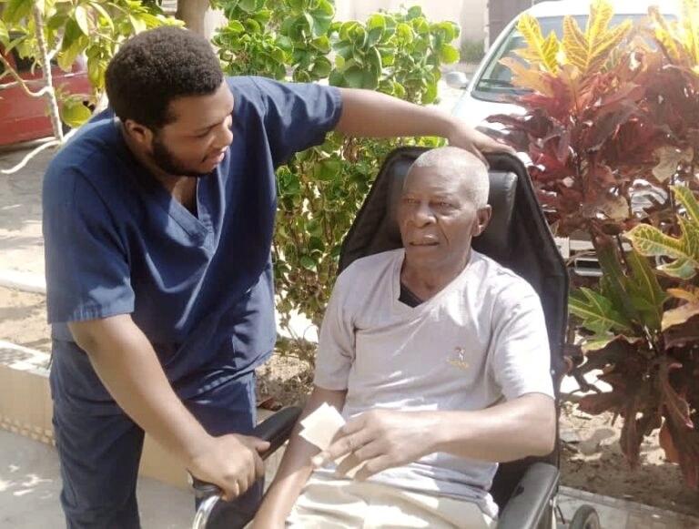 Comfort-focused care support for an older client.
